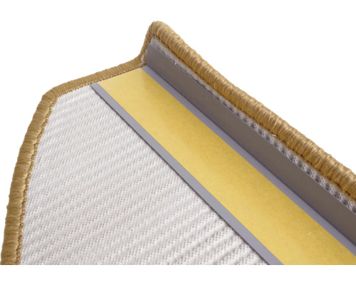 Detaljvy av en mattkant med fästband