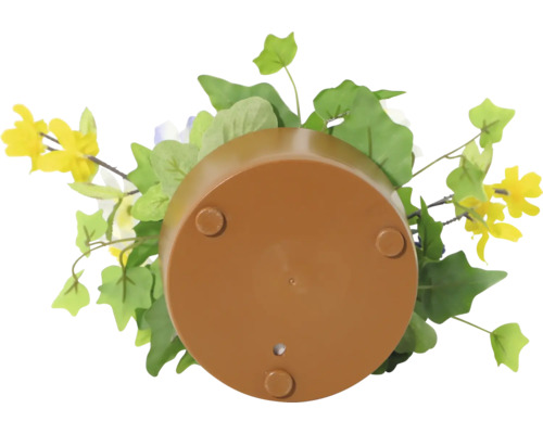 Blomkruka med konstgjorda blommor underifrån