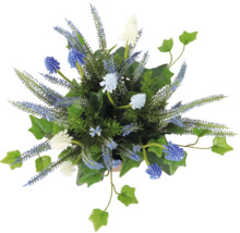 Blomsterarrangemang med diverse konstgjorda blommor och blad