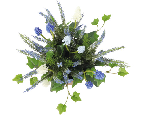 Blomsterarrangemang med diverse konstgjorda blommor och blad