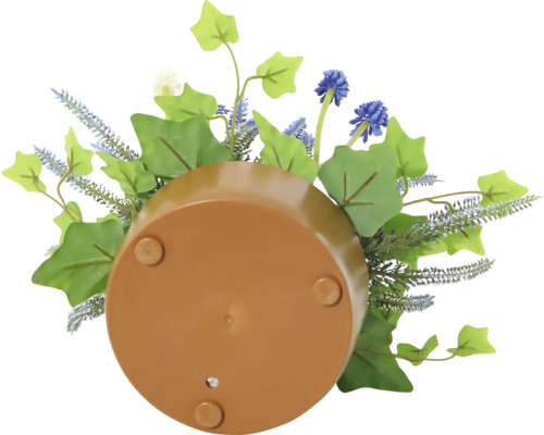 Underifrånvy av en blomkruka med konstgjorda växter