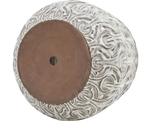 Blomkruka med ornamentalt mönster och dräneringshål