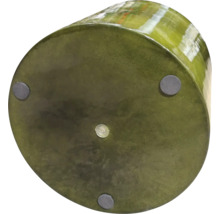 Undersidan av en rund planteringskruka med fötter