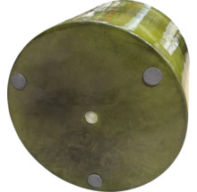 Undersidan av en blomkruka med fötter