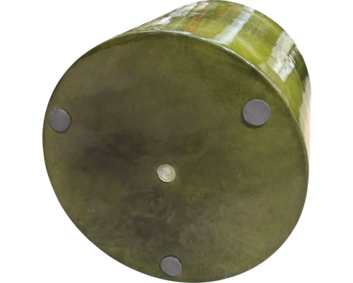 Undersidan av en blomkruka med fötter