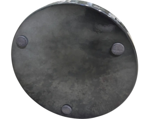 Undersida av en rund blomkruka med fötter