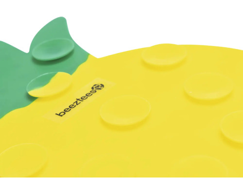 Beetztess logotyp på en ananasformad matplats för husdjur med sugkoppar