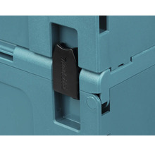 Detaljvy av ett låsspänne på Makita MAKPAC verktygsväska med Makita Logo.