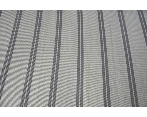 Närbild på ett vävt tyg med vertikalt randigt mönster.