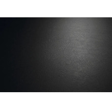 Strukturerad yta med matt finish och en fin, oregelbunden struktur.