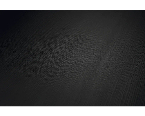 Närbild på en svart yta med fin, linjär träådring.