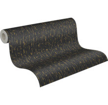 Non-woventapet med strukturerad yta och vertikalt mönster i svart och guld.