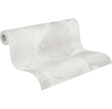 Non-woven tapet med fjädermotiv och strukturerad yta, delvis utrullad.