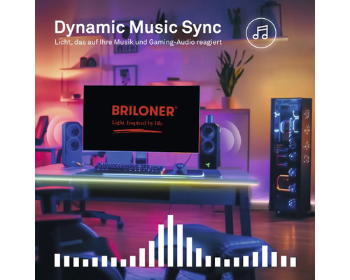 Gaming-setup med bildskärm inklusive Briloner Logo, högtalare och PC-chassi, med musiksynkroniserad smart LED-belysning.