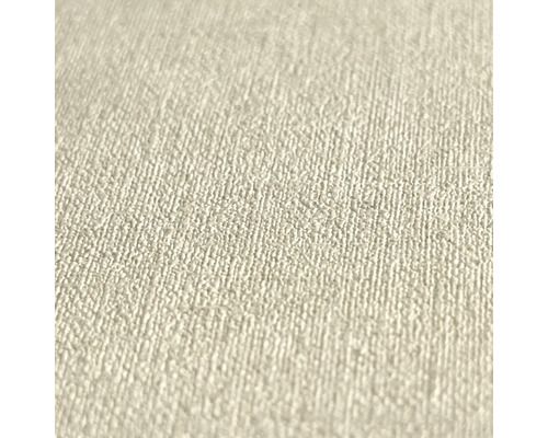 Närbild av en beige non-woventapet med en fin, kornig strukturyta.