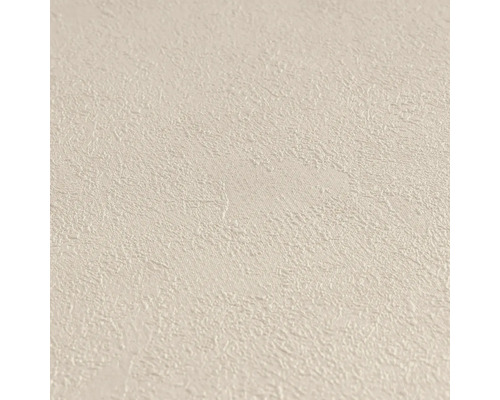 Strukturerad non-woven tapet i beige putslook.