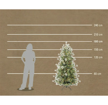 Konstgjord julgran med belysning och snöeffekt, höjd 180 centimeter, storleksjämförelse med en person.