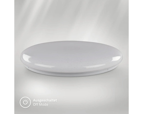 Rund, platt LED-taklampa med stjärneffekt i avstängt läge.