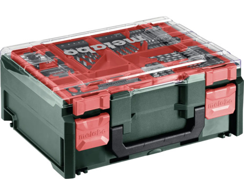 Grön Metabo verktygsväska med transparent lock och röda lås innehållande borrset och bitssats.