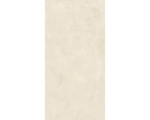 Beige granitkeramikplatta i betonglook med matt yta.