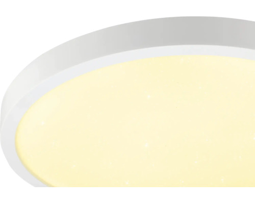Rund LED-taklampa i plast med stjärnhimmelseffekt.