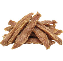 Hundgodis bestående av torkade köttremsor.