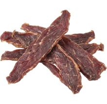 Torkade köttremsor som hundgodis eller tuggbitar för hundar.