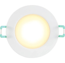 Rund, vit LED-downlight med varmvitt ljus och monteringsfjädrar på sidorna.