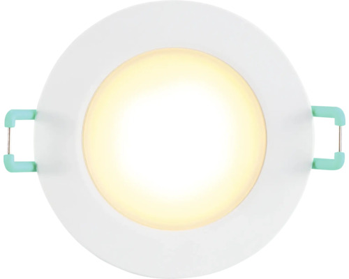 Rund, vit LED-downlight med varmvitt ljus och monteringsfjädrar på sidorna.