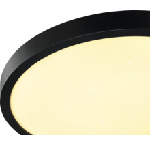 Rund LED-taklampa med svart ram och diffuser med stjärneffekt.