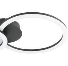 Modern ringformad LED-taklampa i metall och plast i svart och vitt.