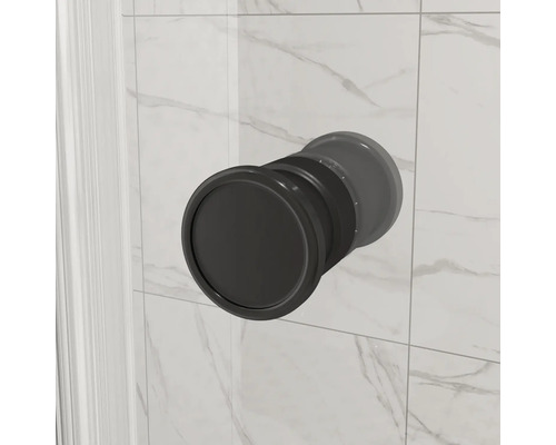 Runt infällt handtag för skjutdörrar i modern design monterat på en kaklad vägg