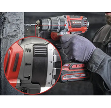 Einhell batteridriven slagborrskruvdragare i användning med detaljvy av vridmoment- och funktionsinställningar.