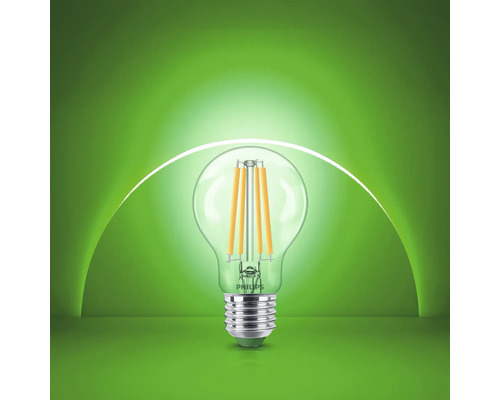 Philips LED glödlampa med filament och E27 sockel i klart glas.