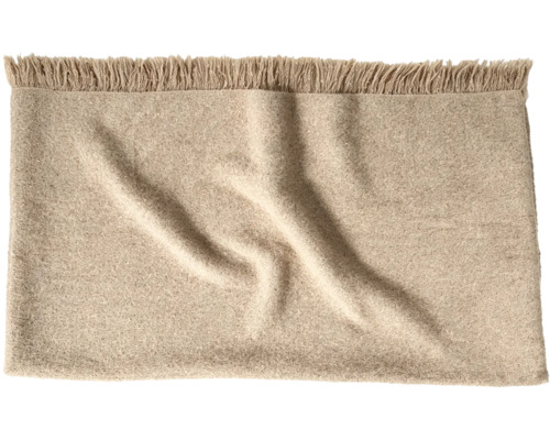 En mjuk pläd med fransar av textil för vardagsrum eller sovrum