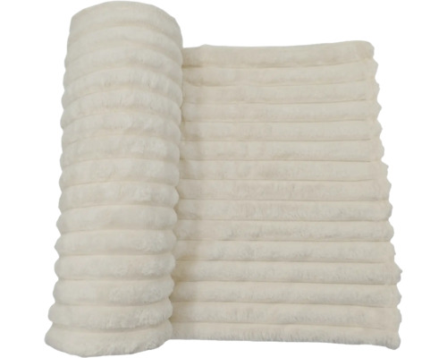 Mjuk pläd med ribbad struktur i fluffigt textilmaterial