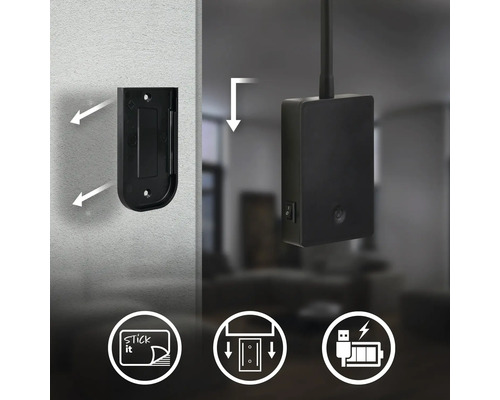 Väggmonteringsfäste med limalternativ för en batteridriven enhet med USB laddningsfunktion