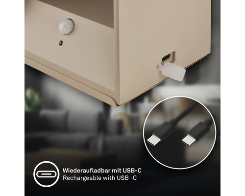 Vägglampa med rörelsedetektor och USB-C laddningsport inklusive laddningskabel.