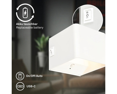 Fyrkantig vägglampa med rörelsedetektor, utbytbart batteri, USB-C anslutning och driftlägen på, av och automatik.