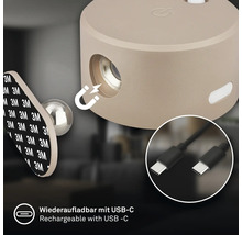 Rund magnetisk LED-lampa med självhäftande fäste och laddningsbar USB C-anslutning.