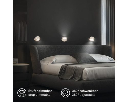 Modern vägglampa för sovrum, stegvis dimbar och trehundrasextio grader vridbar för direkt och indirekt belysning ovanför sängen.