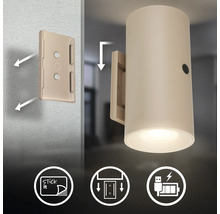 Cylindrisk vägglampa med batteridrift inklusive monteringsplatta med häftfunktion och USB laddningsport.