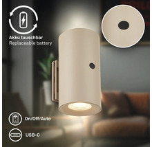 Cylindrisk LED-vägglampa med batteri, utbytbart batteri, USB-C-port och On-Off-Auto-kopplingsfunktion.