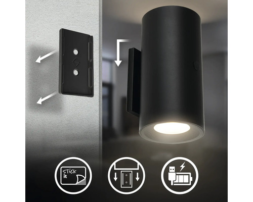 LED vägglampa för montering med självhäftande platta eller skruvar, uppladdningsbar via USB, cylindrisk design med nedåtriktat ljus.