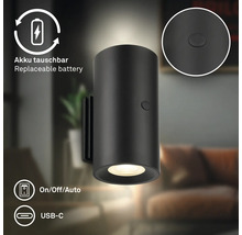 Cylindrisk LED-vägglampa med utbytbart batteri, rörelsedetektor och USB-C-anslutning.