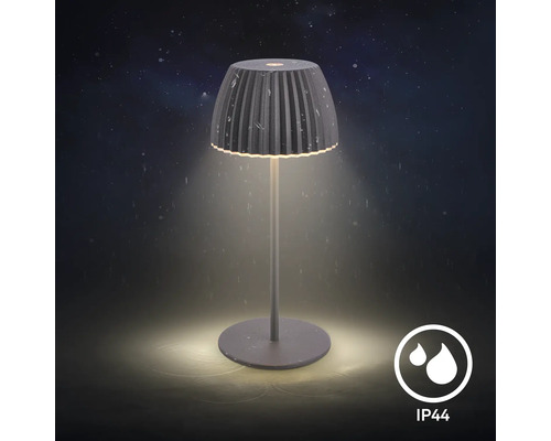 Modern LED bordslampa for utomhusbruk med skarm och kapslingsklass IP44 for skydd mot vattenstank