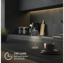 Modern LED bordslampa på en köksbänk, ger 24 timmars ljus vid den lägsta dimnivån.