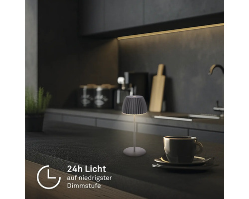 Modern LED bordslampa på en köksbänk, ger 24 timmars ljus vid den lägsta dimnivån.