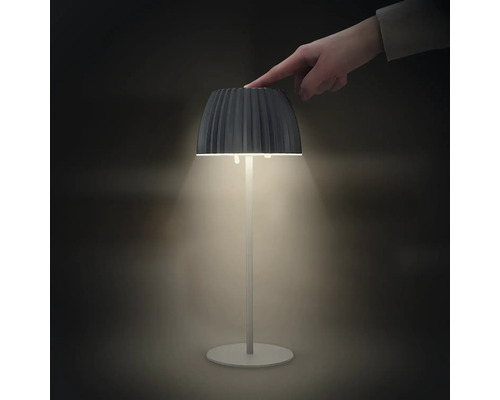 Modern LED bordslampa med touch funktion, batteridriven och dimbar, perfekt som nattlampa eller dekorativ belysning.