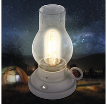 Dekorativ LED campinglykta i klassisk design med glaskupa för stämningsfull belysning vid camping eller utomhusbruk.